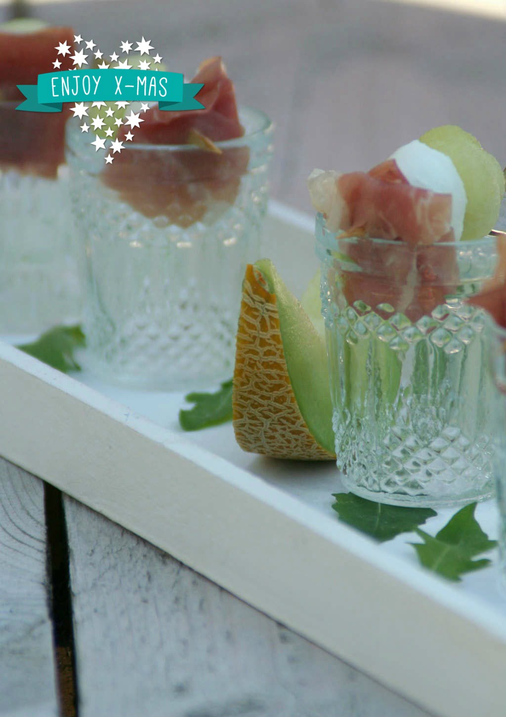 Meloen met parmaham in een glaasje